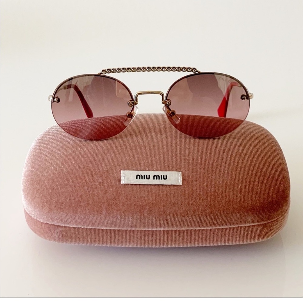 MIU MIU aviator sunglasses with pink lens with rhinestone bridge